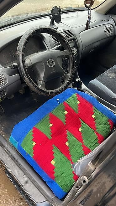 граната мазда 323: Mazda 323: 1998 г., 1.6 л, Механика, Бензин, Седан — 4
