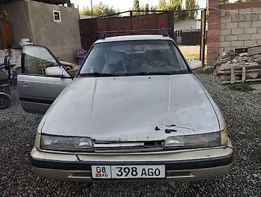 бюджетные авто: Mazda 626: 1991 г., 2 л, Механика, Седан — 3