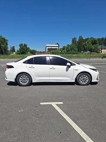 рестайлинг: Toyota Corolla: 2023 г., 1.8 л, Вариатор, Гибрид, Седан — 9