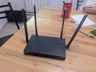 Модемы и сетевое оборудование: Двухдиапазонный Wi‑Fi маршрутизатор Tenda AC1200 (серия W15E/W18E) — 1