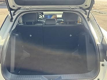 гибрит авто: Toyota bZ5: 2025 г., Электромобиль, Лифтбек — 10