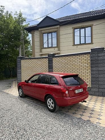 Mazda: Mazda 323: 2002 г., 1.6 л, Механика, Бензин, Хэтчбэк — 1