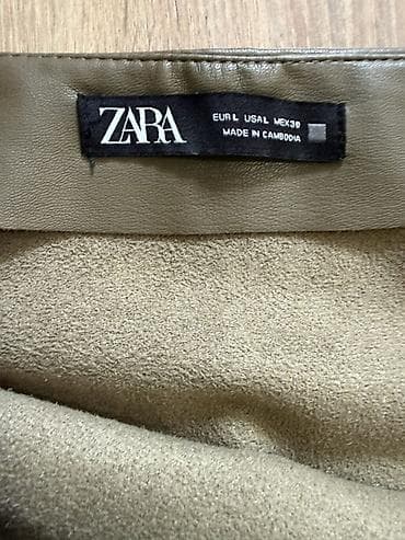 ZARA: юбка из эко‑кожи Юбка: - Модель миди с асимметричной планкой и — 2