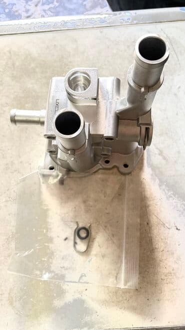 Опель ! Opel!Корпус термостата опель,шевроле! Новый фирменный z16xep