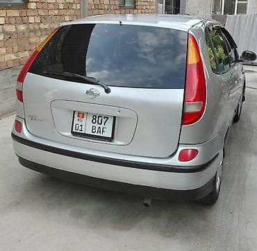 уна: Nissan Tino: 2002 г., 1.8 л, Автомат, Бензин, Минивэн — 1