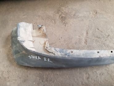 брызговики газ 53: Nissan X Terra брызговик, Ниссан Икстерра Задний правый брызговик — 2