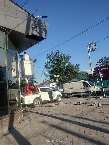 Аренда автовышки (телескопическая вышка на базе пикапа) - Рабочая
