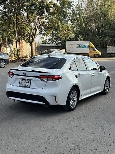 corolla 2016: Toyota Corolla: 2022 г., 1.8 л, Автомат, Гибрид, Седан — 4