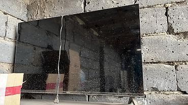 Телевизор KONKA, плоская панель, диагональ примерно 43–50". - Тонкие