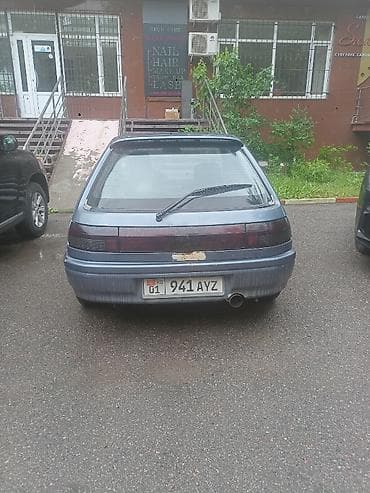 Mazda: Mazda 323: 1990 г., 1.8 л, Механика, Бензин, Хэтчбэк — 3