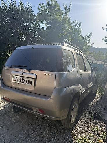 Унаа сатуу: Suzuki Ignis: 2004 г., 1.3 л, Кол менен иштөөчү, Бензин, Хетчбек — 4