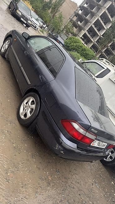 Mazda 626: 1997 г., 2 л, Механика, Бензин, Седан
