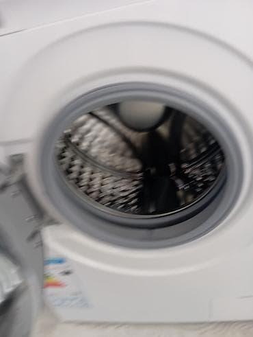 a 73: Стиральная машина с фронтальной загрузкой. Основные характеристики: - — 1