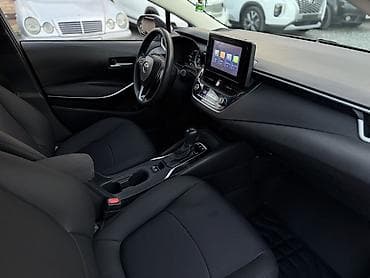 byd e2 2021: Toyota Corolla: 2021 г., 1.8 л, Вариатор, Гибрид, Седан — 6