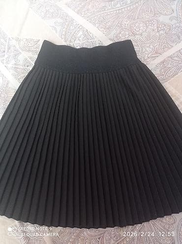 отдам в дар: Отдам за литровую бутылку любого растительного масла две юбки ( одна — 1