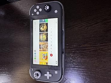 Nintendo: Nintendo Switch Lite, серый цвет. Особенности и комплект: - — 1