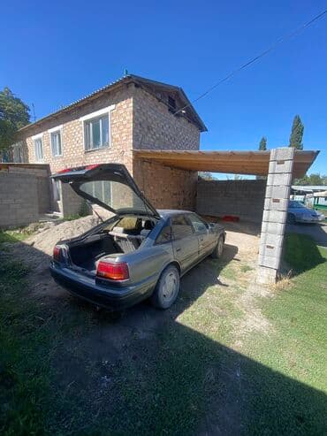 Mazda 626: 1990 г., 2.2 л, Механика, Бензин, Хетчбек — 7