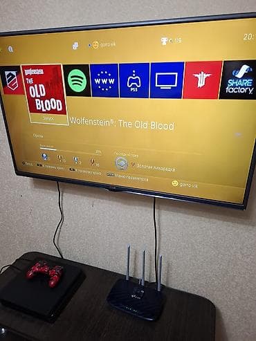 fc25 ps4: PlayStation 4 Slim, модель PS4-263. Игровая приставка в черном — 2