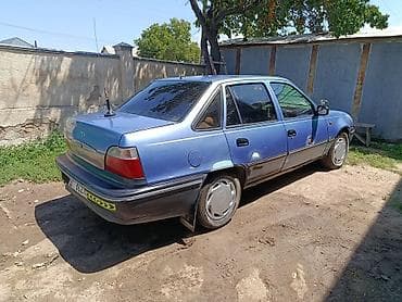 два авто: Daewoo Nexia: 2008 г., 1.5 л, Седан — 6