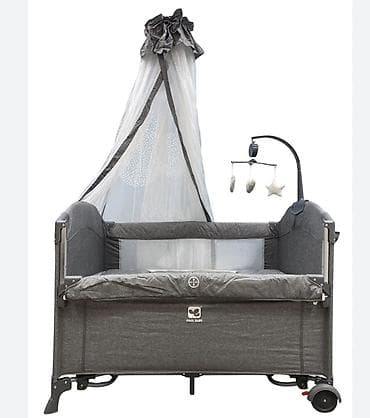 Детская кроватка-манеж Cooc Baby с навесным балдахином и мобилью -