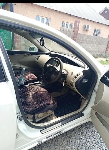 xedos 9: Nissan Primera: 2001 г., 2 л, Бензин — 2