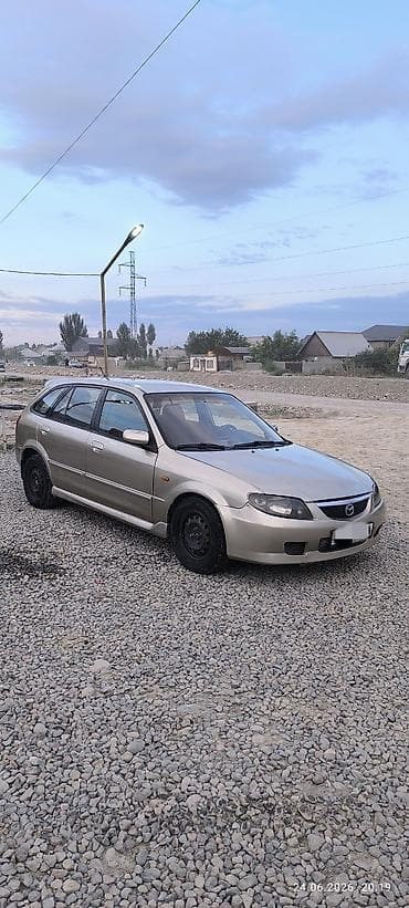 mazda 626 кронос: Mazda 323: 2003 г., 1.6 л, Автомат, Бензин, Хэтчбэк — 2