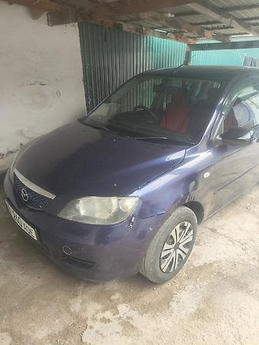 Mazda Demio: 2003 г., 1.3 л, Автомат, Бензин, Хетчбек — 7