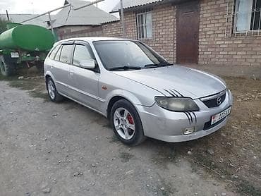 mini ev: Mazda Familia: 2002 г., Механика, Дизель, Универсал — 5