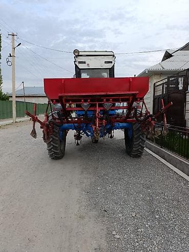 монипулятор кант: Колёсный трактор с навесным культиватором/сеялкой (междурядная — 7