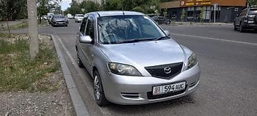 калганы: Mazda Demio: 2003 г., Автомат, Бензин — 7