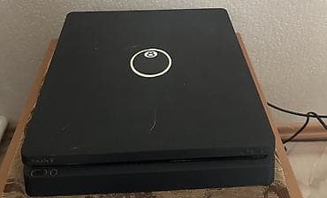 Игровая приставка Sony PlayStation 4 Slim (чёрная) с двумя геймпадами