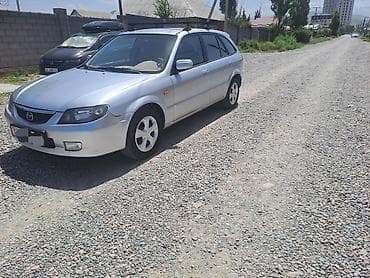 продаю mazda: Mazda Familia: 2002 г., 1.6 л, Механика, Бензин, Универсал — 4