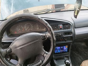 решетка мазда 323: Mazda 323: 1992 г., Седан — 5