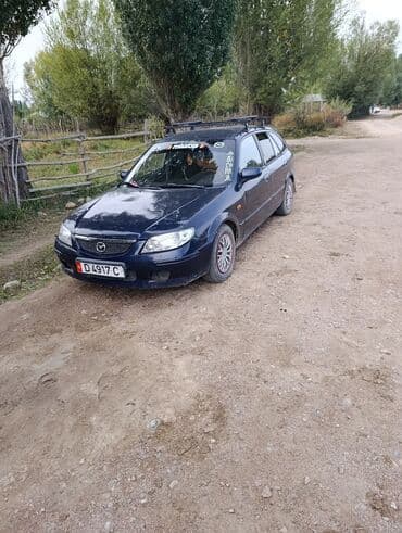 купить бокс на крышу автомобиля бу: Mazda 323: 2002 г., 2 л, Механика, Дизель, Универсал — 1