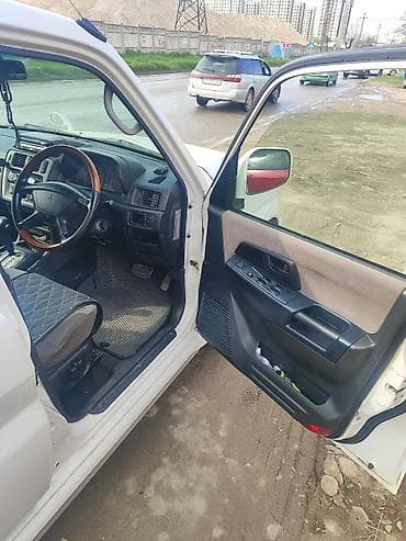 Mitsubishi Pajero iO: 2003 г., 2 л, Автомат, Бензин, Внедорожник — 9
