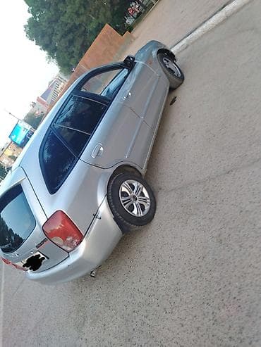 кия рио 2003: Mazda 323: 2003 г., 1.6 л, Механика, Бензин, Хэтчбэк — 3