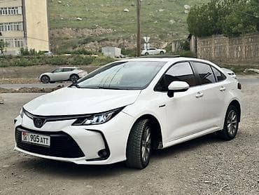 e6 3: Toyota Corolla: 2019 г., 1.8 л, Вариатор, Гибрид, Седан — 2