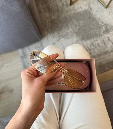 Солнцезащитные очки Miu Miu Брала намного дороже - Модель с