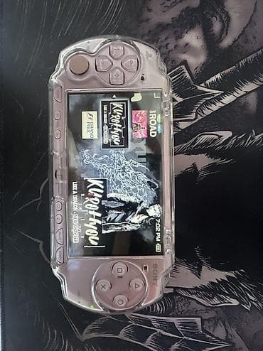 PSP (Sony PlayStation Portable): Игровая консоль Sony PSP (серия 2000) Прошитая, розового цвета. Для — 2