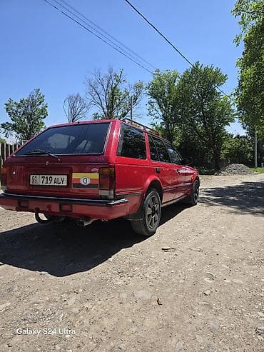 Datsun: Nissan Bluebird: 1988 г., 2 л, Механика, Бензин, Универсал — 4