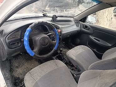 бампер мазда 323f: Daewoo Lanos: 2007 г., Ручные, Бензин, Седан — 2