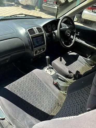 атего 1229: Mazda Familia: 1998 г., 1.8 л, Автомат, Бензин, Универсал — 8