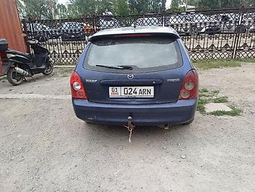 thindiag 2: Mazda Familia: 2002 г., 2 л, Механика, Дизель, Хэтчбэк — 4