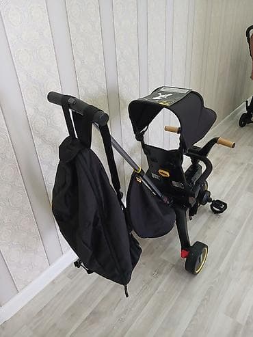 Детский трёхколёсный велосипед-коляска Doona Liki Trike S5 (черный) - — 2