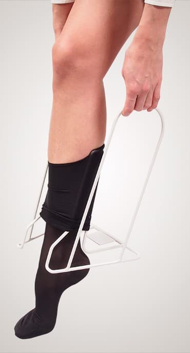 функциональная кровать для лежачих больных: Приспособление для надевания компрессионного трикотажа Ergoforma E — 1