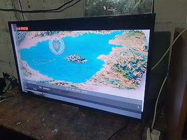 tab s: Телевизор VISION (диагональ примерно 32–40") с LED‑подсветкой. - — 2