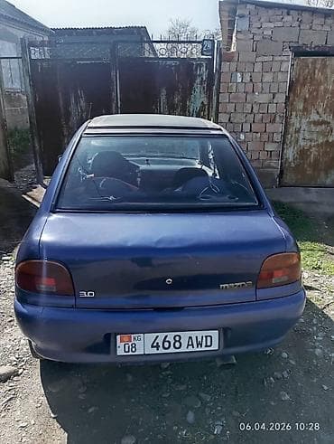 е30 e30: Mazda 121: 1994 г., Механика, Бензин, Хэтчбэк — 3