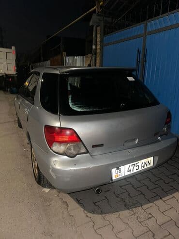 зимнее: Subaru Impreza: 2005 г., 1.5 л, Автомат, Бензин, Универсал — 5