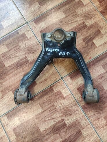 запчасти на мицубиси паджеро 2: Передний правый рычаг Mitsubishi Б/у, Оригинал — 1