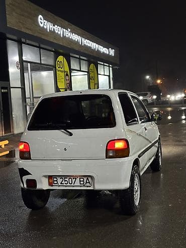 Daihatsu: Daihatsu Cuore: 1995 г., 0.9 л, Механика, Бензин, Хетчбек — 9